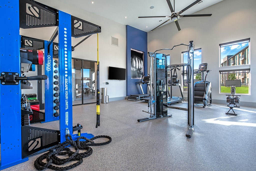 the gym at the flats at big tex apartments