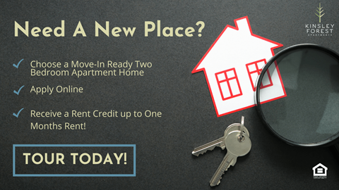 A promotional image for a move-in ready two bedroom apartment with a tour option.