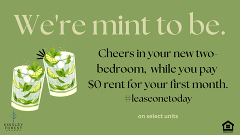 A mint-themed advertisement for Kinsley Forest apartments offering a free first month's rent.