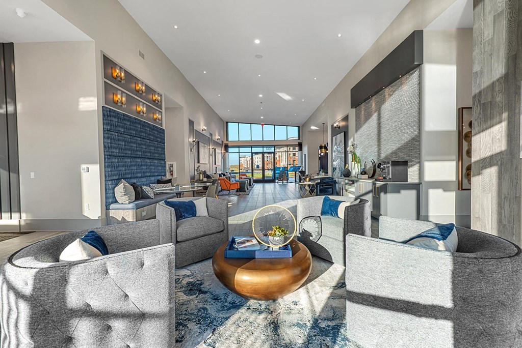 a living room with couches and a table