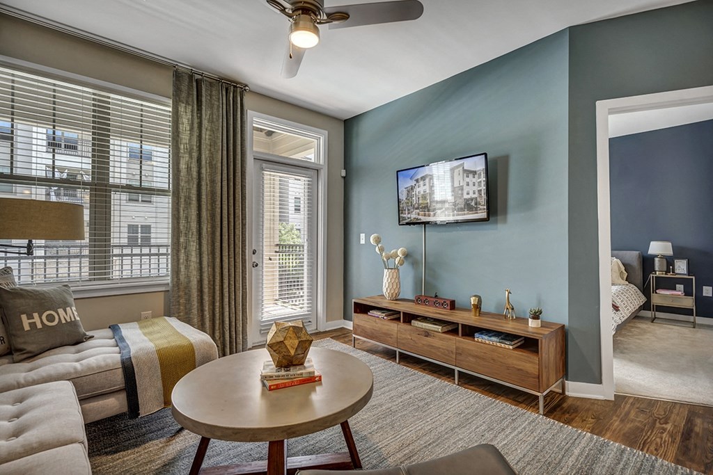 a living room with a couch and a tv