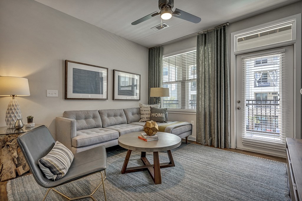 a living room with a couch and a table