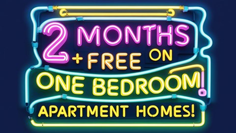A neon sign advertises 2 months free on one bedroom apartment homes.