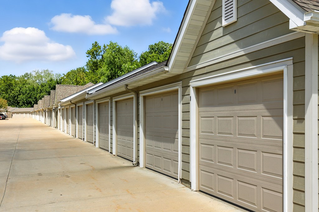 A long row of garage doors are closed at Bramblett Hills Luxury Apartments in O Fallon MO 63366