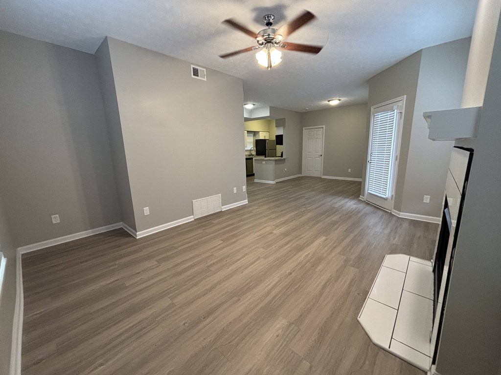 Fenwick Place Apartments in Louisville, KY 40220 - Living room looking into the kitchen