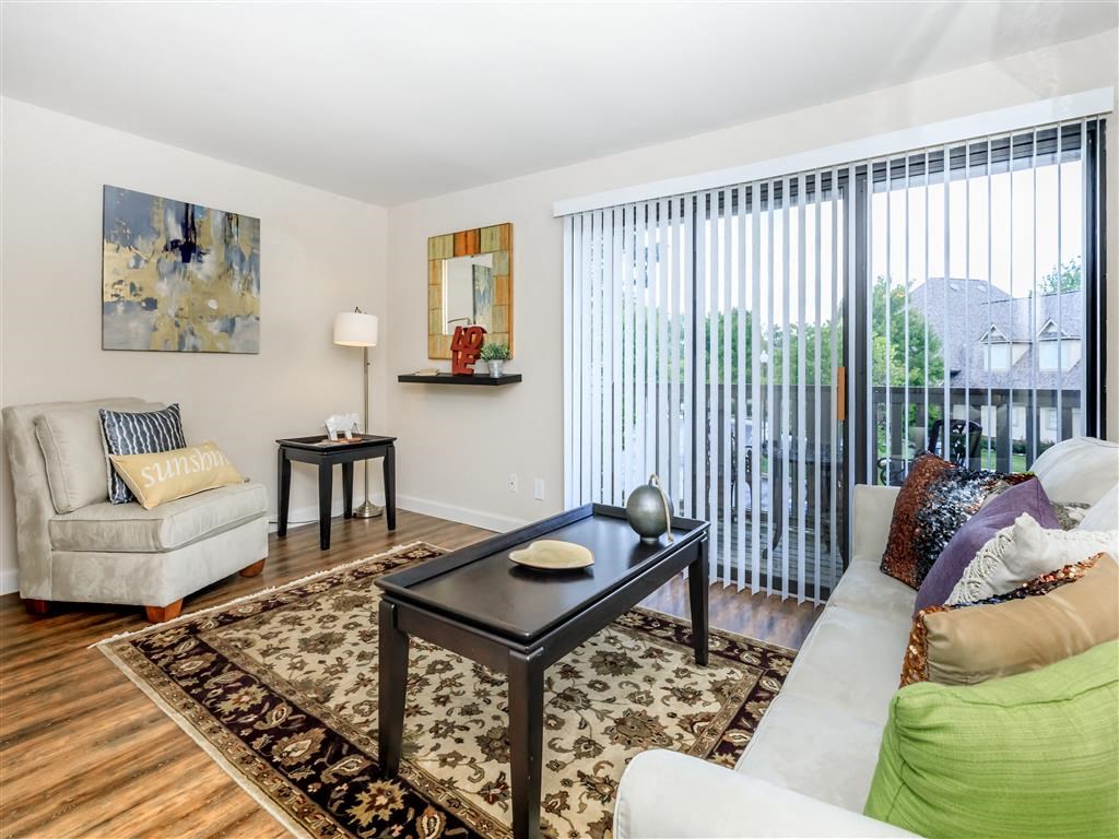 a living room with a couch and a table