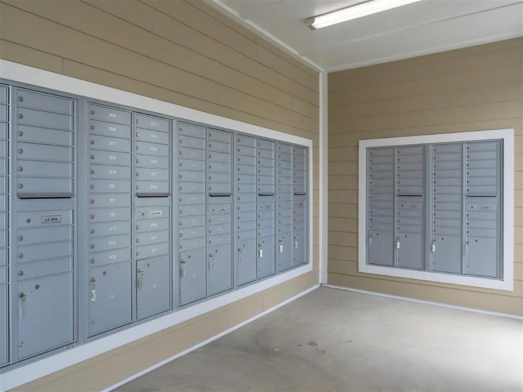 a row of lockers in a room with a window