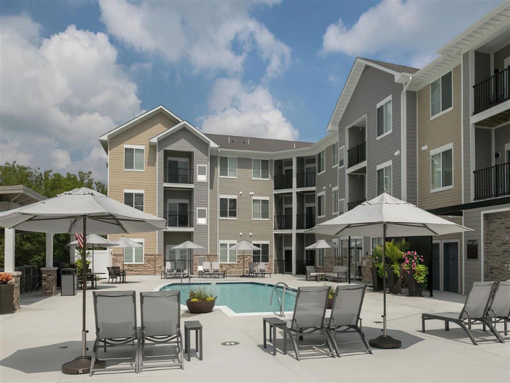 our apartments offer a pool and lounge area with umbrellas