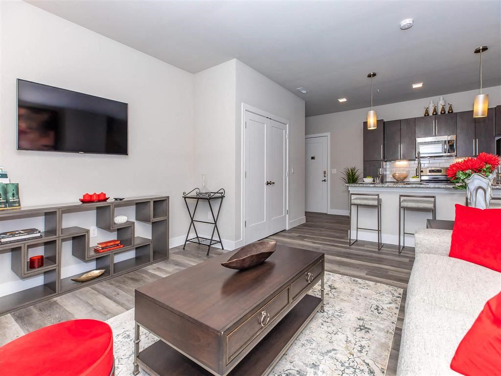 a living room with a couch and a tv