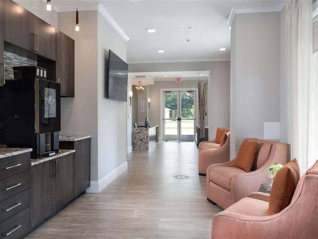 a living room with couches and a tv