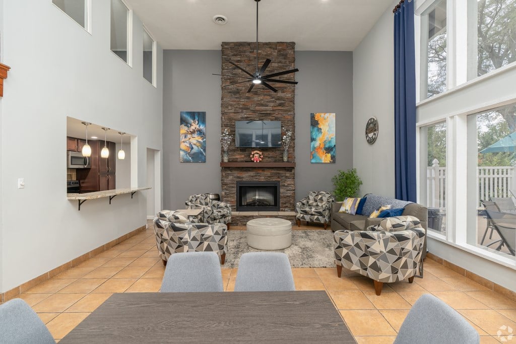 A living room with a fireplace and a couch.