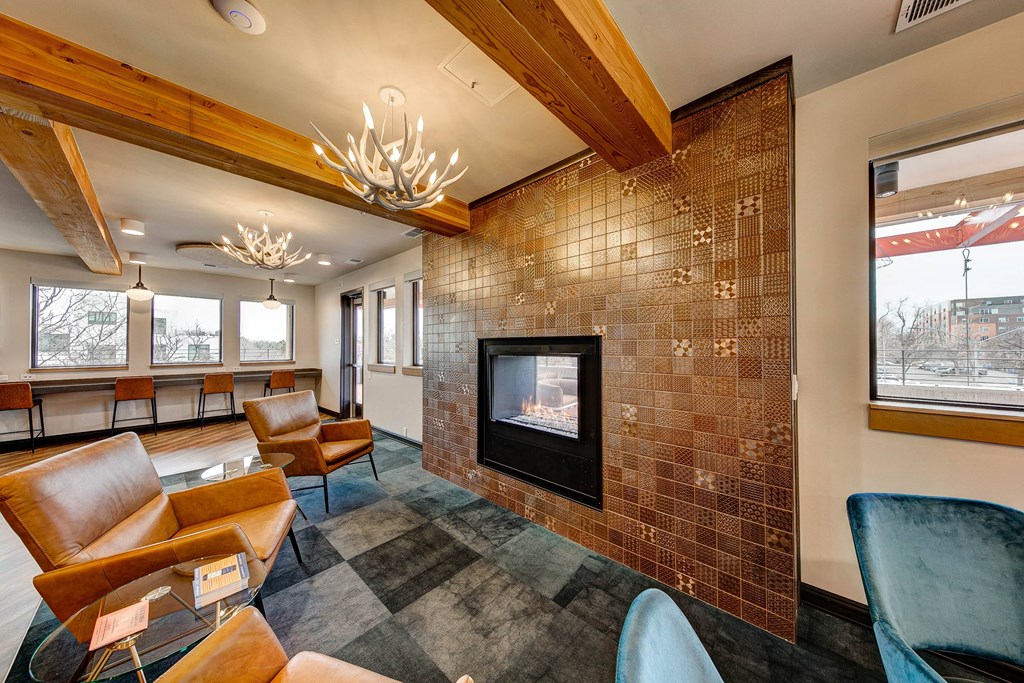 Indoor/outdoor fireplace in Oak 140 community room