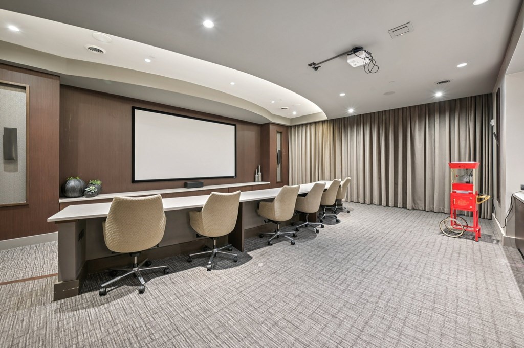 A conference room with a long table and chairs at Everra Midtown Park Apartments, Texas, 75231