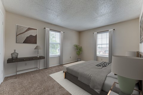 A bedroom with a bed, a bench, and a window.