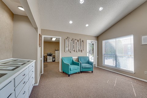 A room with a white ceiling and a brown carpet.