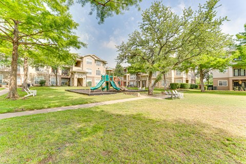 A playground at The Brazos, Dallas, TX, 75287