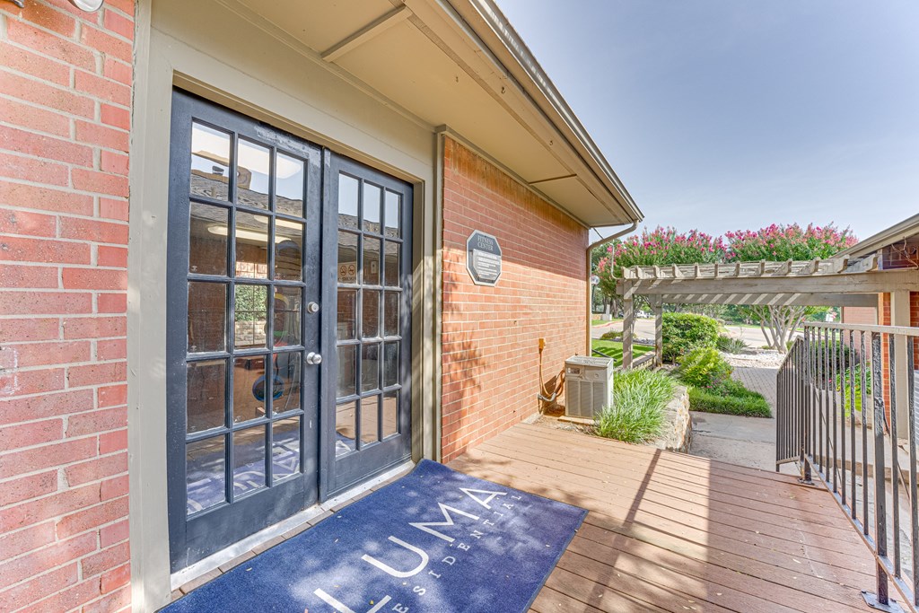 A blue mat with the word at Copper Hill Apartments, Bedford, Texas