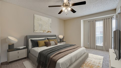 A bedroom with a large bed, a ceiling fan, and a painting on the wall.
