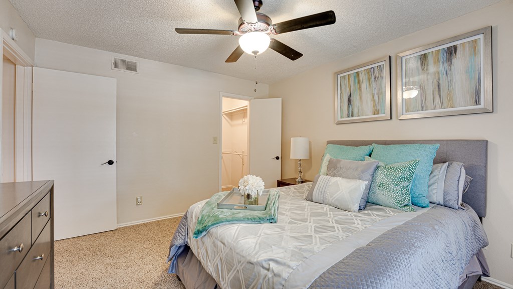 Bedroom With Ceiling Fan at Hunters Hill, Dallas, TX, 75287