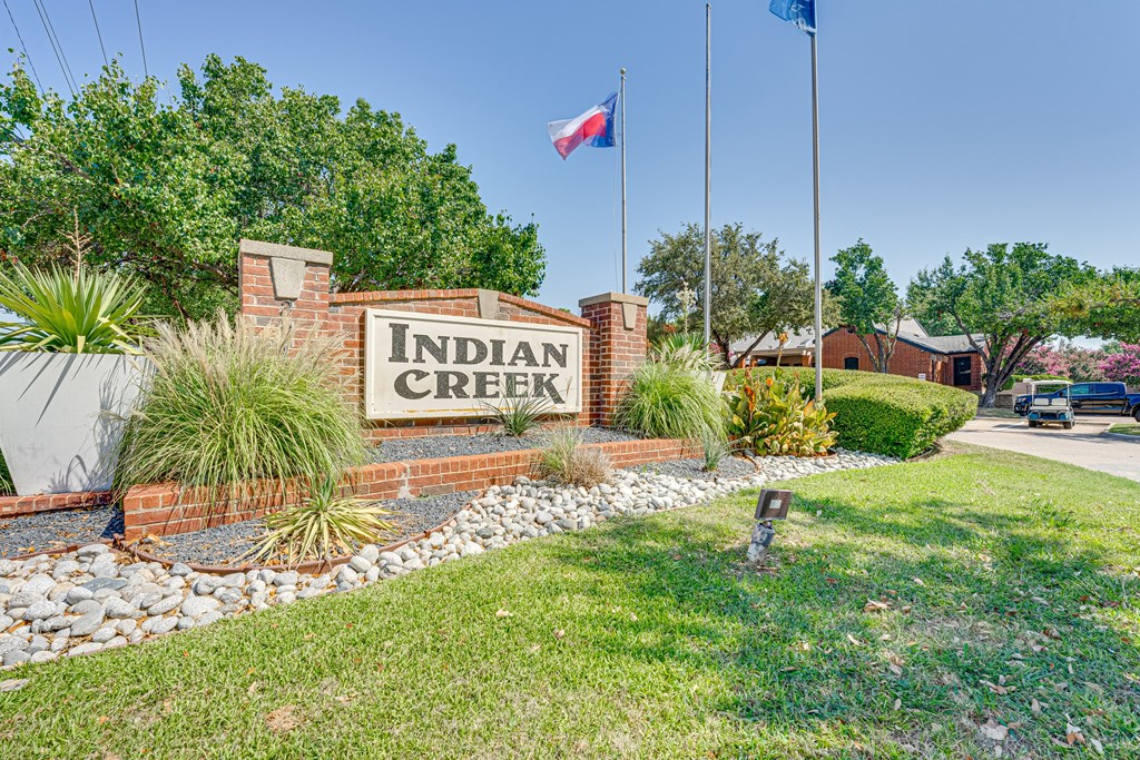 the sign creek at the entrance to the subdivision at Indian Creek Apartments, Texas