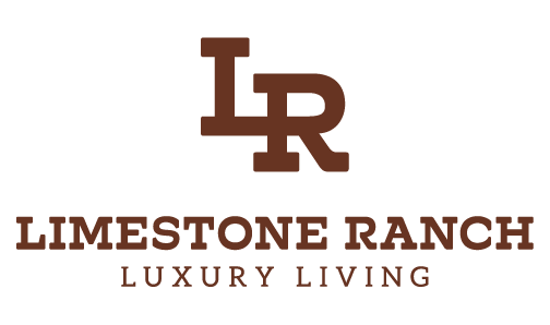 Property entrance sign with logo at Limestone Ranch Apartments, Lewisville, TX 75067