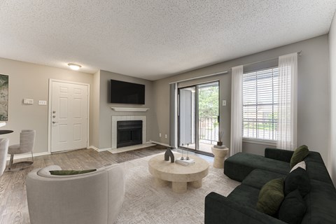 Living Area With Fireplace at The Manhattan Apartments, Dallas, TX