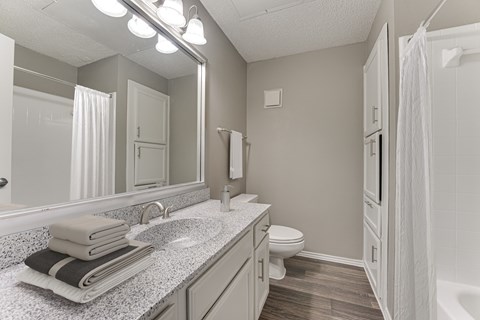 Bathroom With Bathtub at The Manhattan Apartments, Dallas