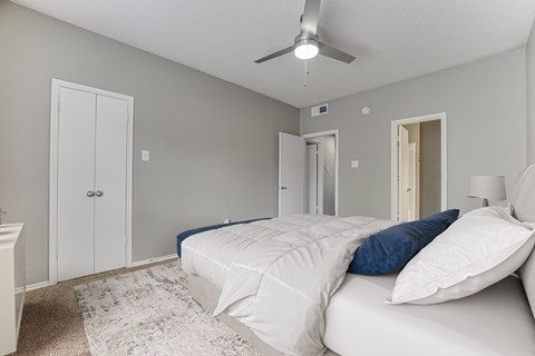 Bedroom With Closet at The Manhattan Apartments, Dallas