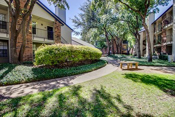 View of walking through property at The Manhattan Apartments, Dallas, TX - Photo Gallery 24