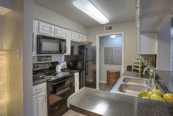 Kitchen Interior Kitchen Interior at The Manhattan Apartments, Dallas