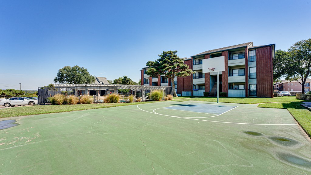 a basketball court in front of a building at Paces Crossing, Denton, 76210