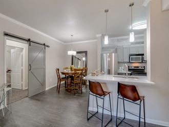 Gourmet Kitchen With Island at Cypress Apartments, Texas