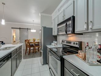 Fully Equipped Kitchen at Cypress Apartments, McKinney, 75070 - Photo Gallery 5