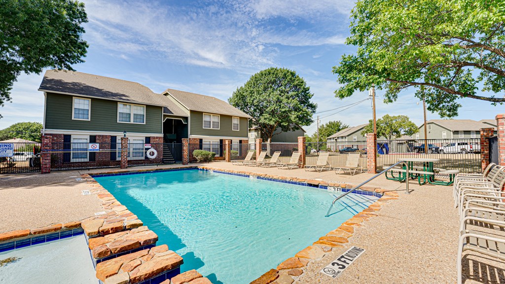 second pool with lounge seating  at Arbors Of Cleburne, Cleburne, TX