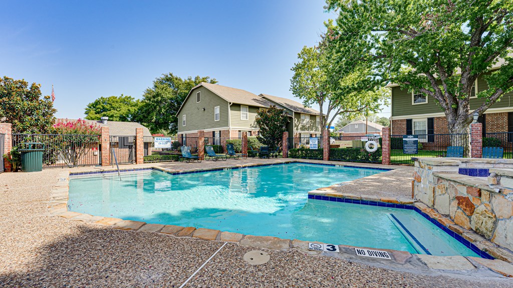 main pool with lounge chairs  at Arbors Of Cleburne, Cleburne, 76033