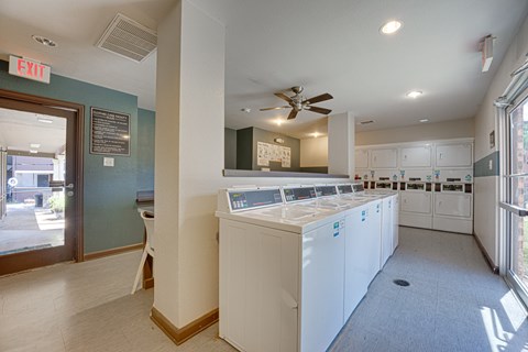 A laundry room with a washer and dryer.