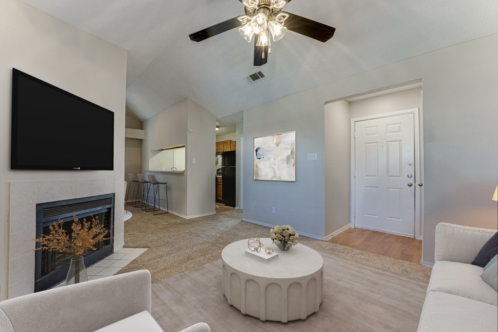 Living Room With Fireplace at Towne Centre Village, Texas