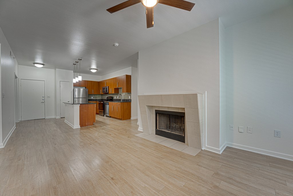 Living Area With Fireplace at Vue Greenville, Texas
