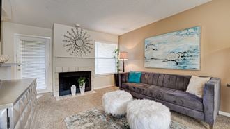 Living Room With Fireplace at Woodland Hills, Irving, Texas