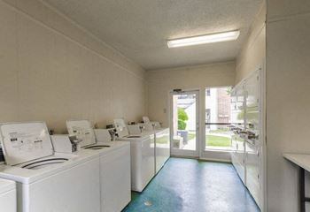 Clothes Care Facility with Washers and Dryers at Wilson Crossing Apartments in Cedar Hill, Texas