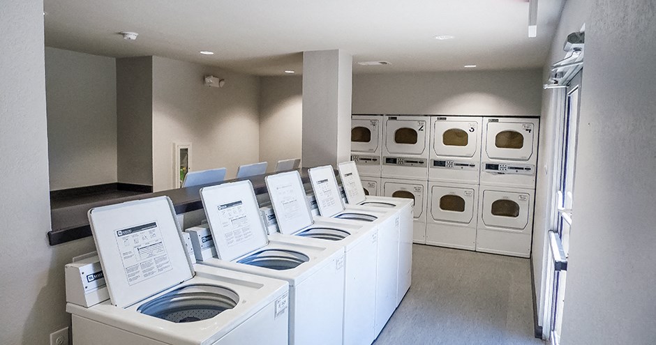 Laundry Room at Timberglen Apartments, Texas