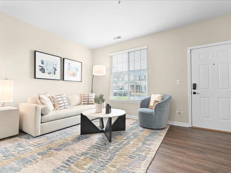 furnished living room with a large window