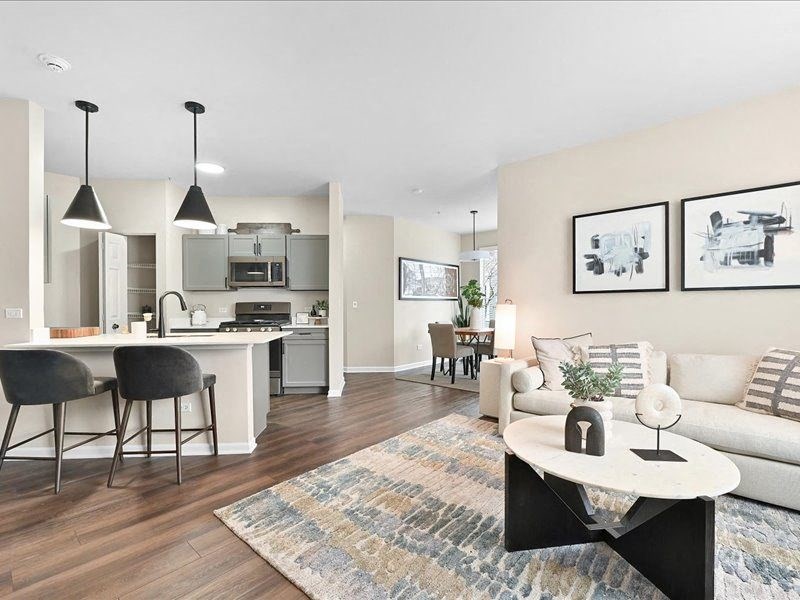 spacious apartment with an open-concept living room and kitchen