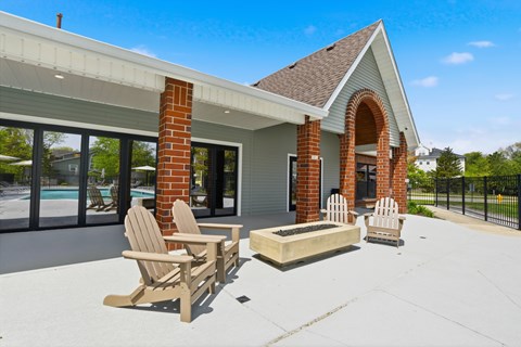 A house with a patio and a fireplace.