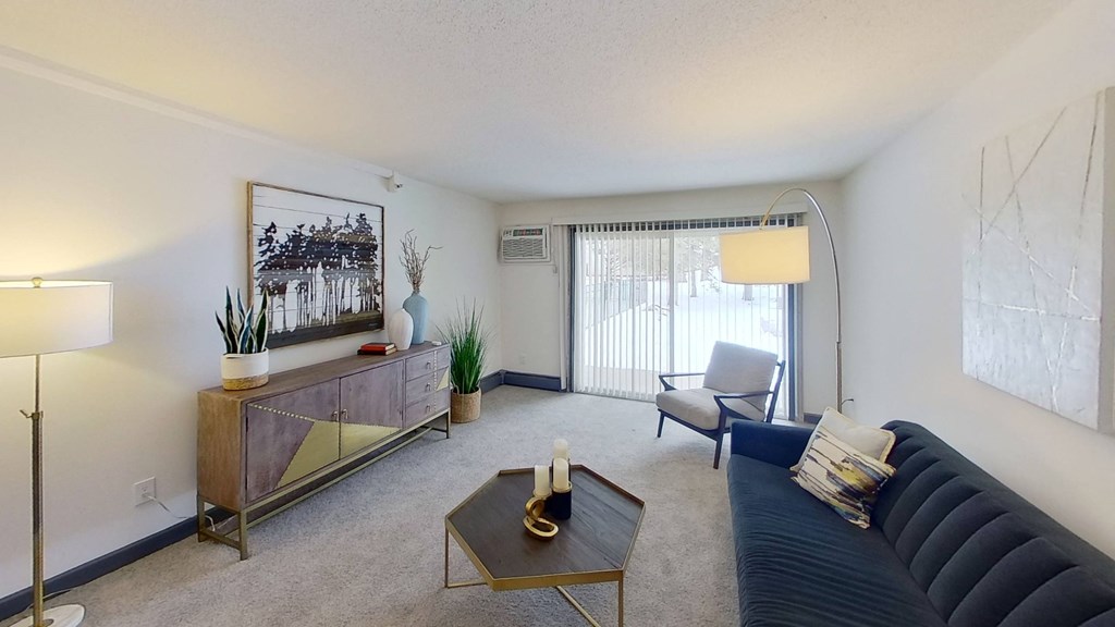 our apartments offer a living room with a blue couch