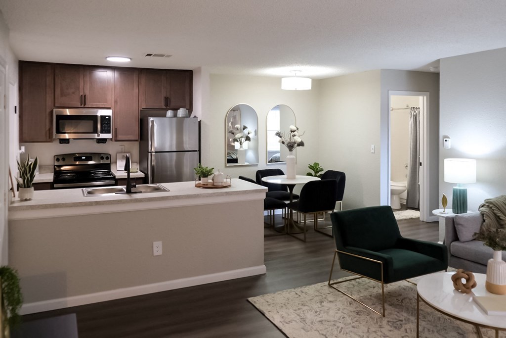 dining area next to an open-concept kitchen