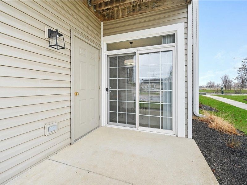 back patio with sliding glass door