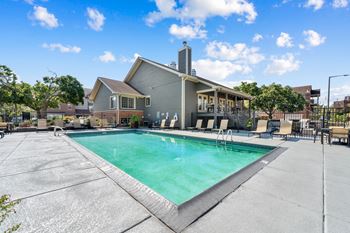 A house with a pool in the backyard.