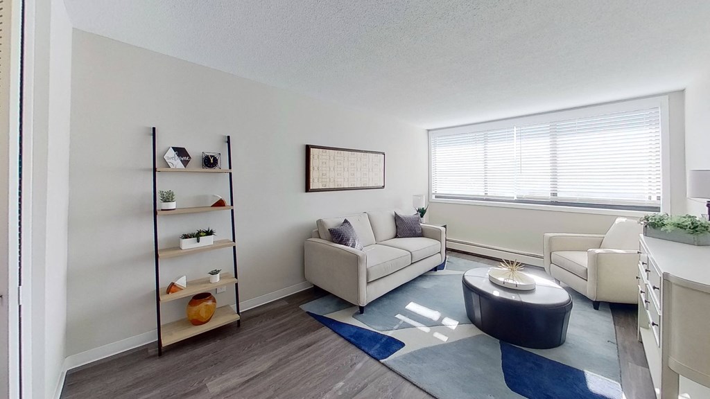 a living room with a couch and a table