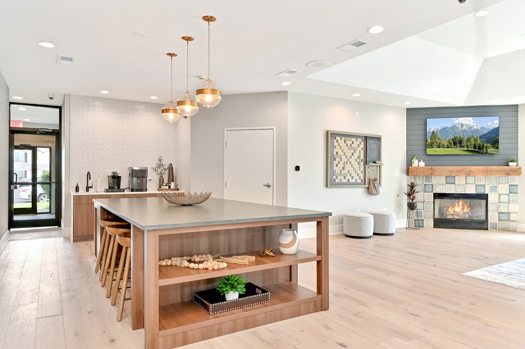 large island in the newly renovated resident clubhouse at Farmington Lakes Apartments
